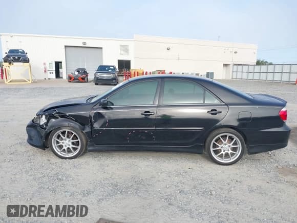 ✅ 2005 Toyota Camry LE • VIN: 4T1BE32K95U088620 • Lot: 43289289. Listed on IAAI with 205,013 mi. Free auction sales archive from the USA and detailed vehicle history report at DreamBid. Image 14.