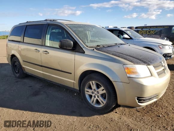 ✅ 2010 Dodge Grand Caravan SE • VIN: 2D4RN4DE8AR255706 • Лот: 82090695. Опубликован ранее на Copart с пробегом 287 251 миль. Бесплатный доступ к архиву аукционных продаж из США и подробный отчёт об истории автомобиля на DreamBid. Изображение 4.
