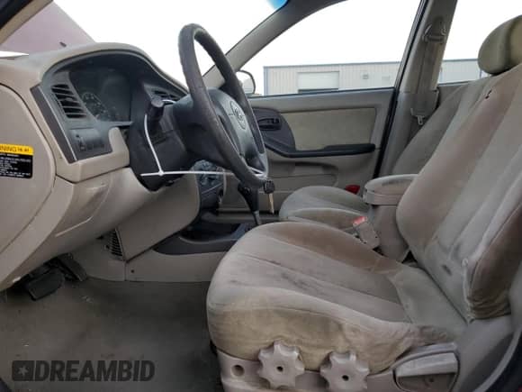 2003 Hyundai Elantra GLS z VIN KMHDN45D53U586516, wystawiony jako Copart lot #80085154 z przebiegiem 199 522 mil mil oraz Szkoda całkowita • Salvage title. Historia ofert i sprzedaży dostępna na DreamBid. Obrazek 7.