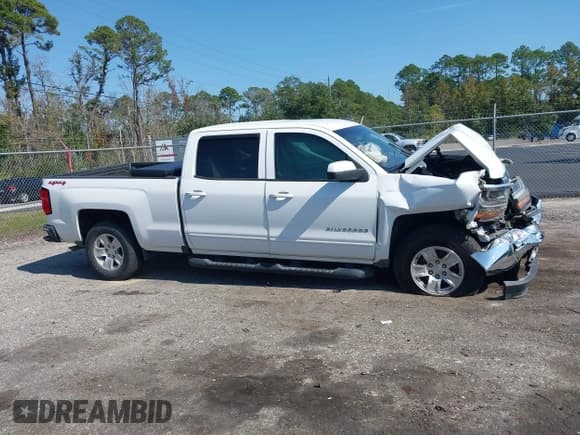 ✅ 2017 Chevrolet Silverado 1500 LT • VIN: 3GCUKRECXHG193252 • Lot: 43488573. Listed on IAAI with 202,376 mi. Free auction sales archive from the USA and detailed vehicle history report at DreamBid. Image 12.