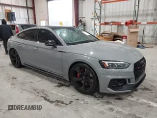 ✅ 2019 Audi RS 5 Sportback • VIN: WUABWCF56KA907850 • Lot: 41555741. Listed on IAAI with 136,980 mi. Free auction sales archive from the USA and detailed vehicle history report at DreamBid. Image 1.