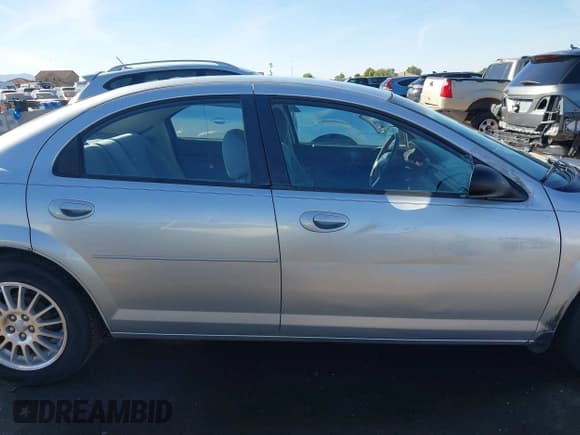 ✅ 2005 Chrysler Sebring • VIN: 1C3EL46X35N659374 • Lot: 43840188. Listed on IAAI with 137,495 mi. Free auction sales archive from the USA and detailed vehicle history report at DreamBid. Image 13.