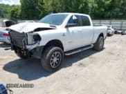✅ 2021 Ram 2500 Big Horn • VIN: 3C6UR5DL1MG554827 • Лот: 42524193. Опубликован ранее на IAAI с пробегом 107 355 миль. Бесплатный доступ к архиву аукционных продаж из США и подробный отчёт об истории автомобиля на DreamBid. Изображение 2.