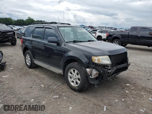 ✅ 2011 Mazda Tribute Sport • VIN: 4F2CY0C79BKM03786 • Lot: 58507065. Listed on Copart with 197,089 mi. Free auction sales archive from the USA and detailed vehicle history report at DreamBid. Image 4.