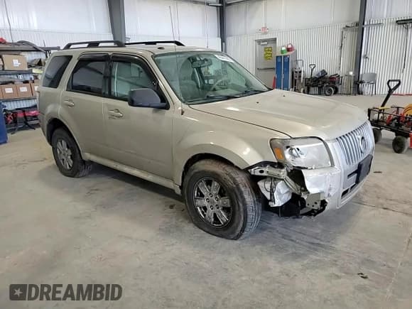 ✅ 2010 Mercury Mariner • VIN: 4M2CN9BG5AKJ11799 • Lot: 46441995. Listed on Copart with 125,871 mi. Free auction sales archive from the USA and detailed vehicle history report at DreamBid. Image 11.