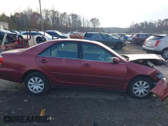 ✅ 2005 Toyota Camry LE • VIN: 4T1BE30K25U002518 • Lot: 43767923. Listed on IAAI with 215,358 mi. Free auction sales archive from the USA and detailed vehicle history report at DreamBid. Image 14.