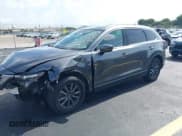 ✅ 2021 Mazda CX-9 Touring • VIN: JM3TCACY1M0503979 • Lot: 42650572. Wystawiony na IAAI z przebiegiem 28 673 mil. Bezpłatny archiwum sprzedaży aukcyjnych z USA i szczegółowy raport historii pojazdu na DreamBid. Zdjęcie 2.
