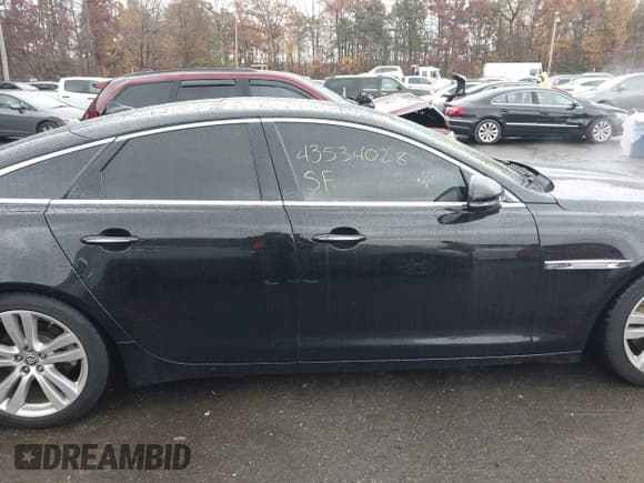 ✅ 2013 Jaguar XJ • VIN: SAJWA1C78D8V58290 • Lot: 43534028. Listed on IAAI with 79,199 mi. Free auction sales archive from the USA and detailed vehicle history report at DreamBid. Image 13.