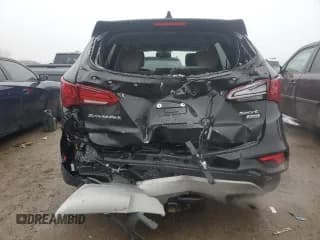 ✅ 2018 Hyundai Santa Fe 2.4L • VIN: 5XYZUDLB0JG512949 • Лот: 39501394. Опубликован ранее на Copart с пробегом 89 092 миль. Бесплатный доступ к архиву аукционных продаж из США и подробный отчёт об истории автомобиля на DreamBid. Изображение 6.