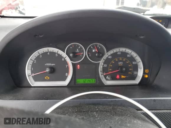 2009 Chevrolet Aveo 1LT z VIN KL1TD56E09B341294, wystawiony jako Copart lot #86139404 z przebiegiem 121 471 mil mil oraz Czysty tytuł • Clean title. Historia ofert i sprzedaży dostępna na DreamBid. Obrazek 9.