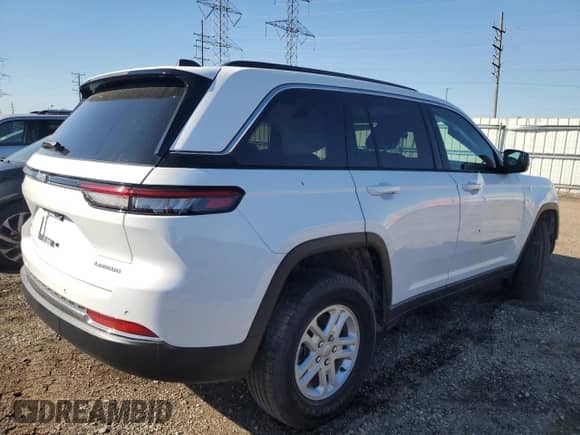 2025 Jeep Grand Cherokee Laredo with VIN 1C4RJHAG0SC266568, listed as a Copart auction lot 83979055 with 15,534 mi miles and Salvage title. Bid and sale history available at DreamBid. Image 3.