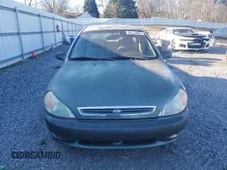 ✅ 2002 Kia Rio • VIN: KNADC123226128937 • Lot: 89225035. Listed on Copart with 218,436 mi. Free auction sales archive from the USA and detailed vehicle history report at DreamBid. Image 5.