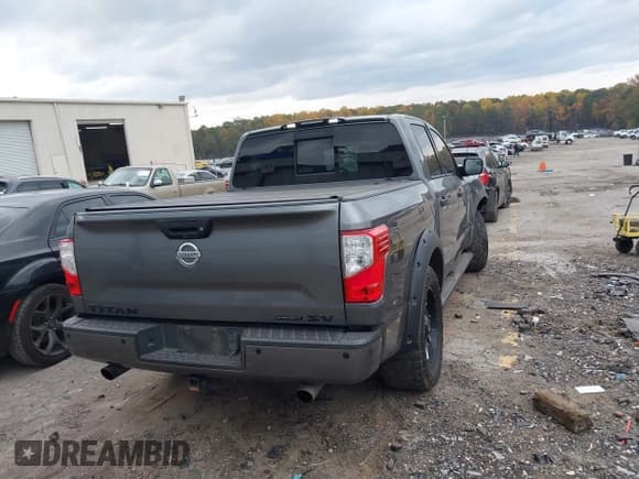 ✅ 2018 Nissan Titan SV • VIN: 1N6AA1E60JN520365 • Lot: 43648139. Listed on IAAI with 125,426 mi. Free auction sales archive from the USA and detailed vehicle history report at DreamBid. Image 4.