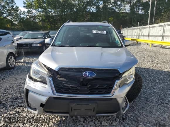 2018 Subaru Forester Touring с VIN JF2SJGWC0JH525161, выставлен на аукционе Copart как лот 70739335 с пробегом 111 390 миль миль и Списание • Salvage title. История ставок и продаж доступна на DreamBid. Изображение 5.