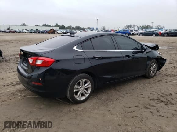 ✅ 2019 Chevrolet Cruze LT • VIN: 1G1BE5SM3K7130106 • Lot: 72475072. Listed on Copart with 50,251 mi. Free auction sales archive from the USA and detailed vehicle history report at DreamBid. Image 3.