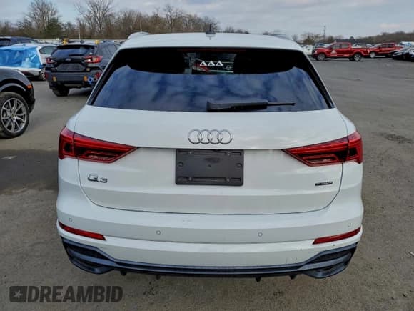 ✅ 2020 Audi Q3 S line Premium • VIN: WA1DECF35L1054165 • Lot: 95489755. Wystawiony na Copart z przebiegiem 49 966 mil. Bezpłatny archiwum sprzedaży aukcyjnych z USA i szczegółowy raport historii pojazdu na DreamBid. Zdjęcie 6.