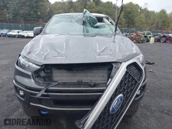 ✅ 2020 Ford Ranger Lariat • VIN: 1FTER4FH0LLA56202 • Lot: 43394940. Listed on IAAI with 65,140 mi. Free auction sales archive from the USA and detailed vehicle history report at DreamBid. Image 12.