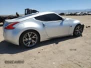 ✅ 2014 Nissan 370Z • VIN: JN1AZ4EHXEM636041 • Лот: 60835255. Опубликован ранее на Copart с пробегом 69 676 миль. Бесплатный доступ к архиву аукционных продаж из США и подробный отчёт об истории автомобиля на DreamBid. Изображение 3.