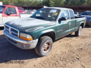 ✅ 2002 Dodge Dakota SLT • VIN: 1B7GG42NX2S657678 • Lot: 43652421. Wystawiony na IAAI z przebiegiem 201 992 mil. Bezpłatny archiwum sprzedaży aukcyjnych z USA i szczegółowy raport historii pojazdu na DreamBid. Zdjęcie 2.