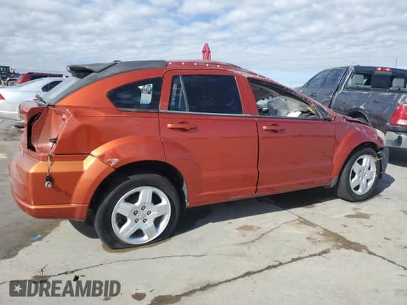 2009 Dodge Caliber SXT с VIN 1B3HB48A79D103294, выставлен на аукционе Copart как лот 42623605 с пробегом 98 798 миль миль и Списание • Salvage title. История ставок и продаж доступна на DreamBid. Изображение 3.
