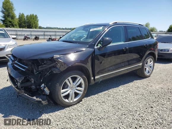 ✅ 2013 Volkswagen Touareg Lux • VIN: WVGEF9BP0DD001565 • Lot: 63070845. Listed on Copart with 123,788 mi. Free auction sales archive from the USA and detailed vehicle history report at DreamBid. Image 1.