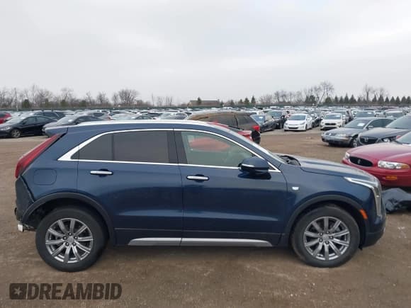 ✅ 2021 Cadillac XT4 FWD Premium Luxury • VIN: 1GYFZCR41MF041306 • Лот: 41143747. Опубликован ранее на IAAI с пробегом 53 116 миль. Бесплатный доступ к архиву аукционных продаж из США и подробный отчёт об истории автомобиля на DreamBid. Изображение 13.
