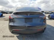 ✅ 2025 Tesla Model Y Long Range • VIN: 7SAYGDED7SF218400 • Лот: 72071165. Опубликован ранее на Copart с пробегом 13 172 миль. Бесплатный доступ к архиву аукционных продаж из США и подробный отчёт об истории автомобиля на DreamBid. Изображение 6.