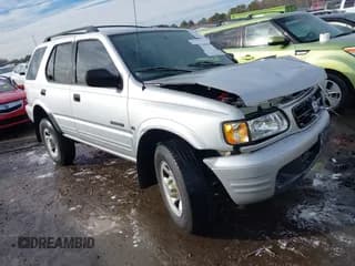 ✅ 2001 Honda Passport LX • VIN: 4S6CK58W014401073 • Lot: 41380551. Listed on IAAI with 259,878 mi. Free auction sales archive from the USA and detailed vehicle history report at DreamBid. Image 1.