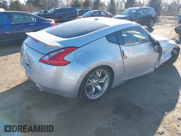 ✅ 2009 Nissan 370Z Touring • VIN: JN1AZ44EX9M401796 • Lot: 43659503. Listed on IAAI with 82,052 mi. Free auction sales archive from the USA and detailed vehicle history report at DreamBid. Image 4.