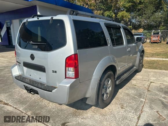 ✅ 2005 Nissan Pathfinder SE • VIN: 5N1AR18U15C709495 • Lot: 93980185. Listed on Copart with 165,042 mi. Free auction sales archive from the USA and detailed vehicle history report at DreamBid. Image 4.