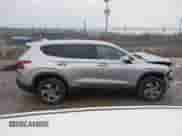 2022 Hyundai Santa Fe SE z VIN 5NMS1DAJ1NH400726, wystawiony jako IAAI lot #41680232 z przebiegiem 21 188 mil mil oraz . Historia ofert i sprzedaży dostępna na DreamBid. Obrazek 14.