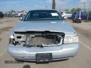 ✅ 2001 Ford Crown Victoria • VIN: 2FAFP73W31X139188 • Lot: 41883697. Listed on IAAI with 142,744 mi. Free auction sales archive from the USA and detailed vehicle history report at DreamBid. Image 13.