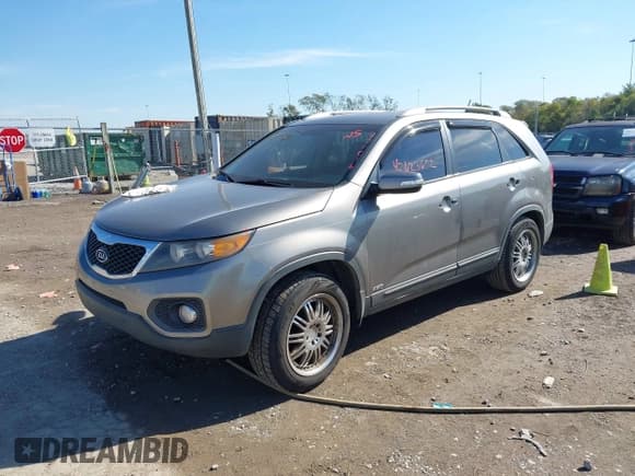 ✅ 2013 Kia Sorento EX • VIN: 5XYKUCA68DG370016 • Lot: 43623652. Listed on IAAI with 242,961 mi. Free auction sales archive from the USA and detailed vehicle history report at DreamBid. Image 2.