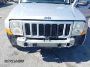 ✅ 2006 Jeep Commander • VIN: 1J8HH48NX6C330781 • Lot: 41604799. Listed on IAAI with 117,200 mi. Free auction sales archive from the USA and detailed vehicle history report at DreamBid. Image 6.