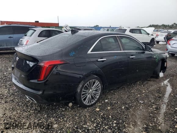 ✅ 2022 Cadillac CT4 Premium Luxury • VIN: 1G6DB5RKXN0136370 • Лот: 83981285. Опубликован ранее на Copart с пробегом 70 292 миль. Бесплатный доступ к архиву аукционных продаж из США и подробный отчёт об истории автомобиля на DreamBid. Изображение 3.