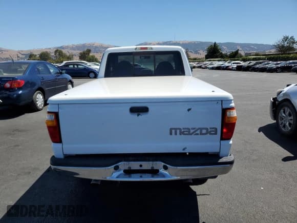 ✅ 2003 Mazda B-Series SE • VIN: 4F4YR16D13TM05738 • Lot: 67868945. Listed on Copart with 90,377 mi. Free auction sales archive from the USA and detailed vehicle history report at DreamBid. Image 6.