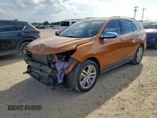 ✅ 2018 Chevrolet Equinox Premier • VIN: 2GNAXMEV2J6220185 • Лот: 81576765. Опубликован ранее на Copart с пробегом 129 975 миль. Бесплатный доступ к архиву аукционных продаж из США и подробный отчёт об истории автомобиля на DreamBid. Изображение 1.