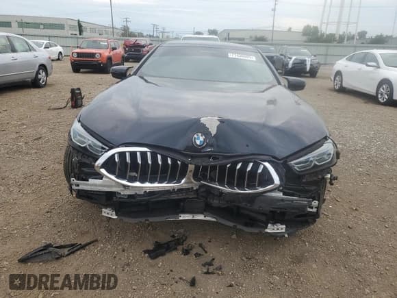 ✅ 2023 BMW 8 Series M850i • VIN: WBAGV8C06PCL31066 • Lot: 71436505. Wystawiony na Copart z przebiegiem 21 670 mil. Bezpłatny archiwum sprzedaży aukcyjnych z USA i szczegółowy raport historii pojazdu na DreamBid. Zdjęcie 5.