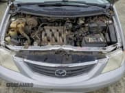 ✅ 2000 Mazda MPV DX • VIN: JM3LW28GXY0106063 • Лот: 93354545. Опубликован ранее на Copart с пробегом Не указан. Бесплатный доступ к архиву аукционных продаж из США и подробный отчёт об истории автомобиля на DreamBid. Изображение 12.