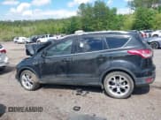 ✅ 2015 Ford Escape Titanium • VIN: 1FMCU0J99FUA73590 • Lot: 42152021. Listed on IAAI with Not provided. Free auction sales archive from the USA and detailed vehicle history report at DreamBid. Image 13.