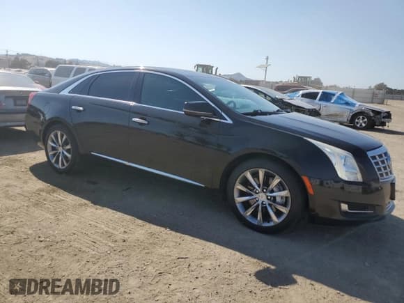✅ 2014 Cadillac XTS Livery • VIN: 2G61U5S30E9258998 • Lot: 60367785. Listed on Copart with 290,755 mi. Free auction sales archive from the USA and detailed vehicle history report at DreamBid. Image 4.
