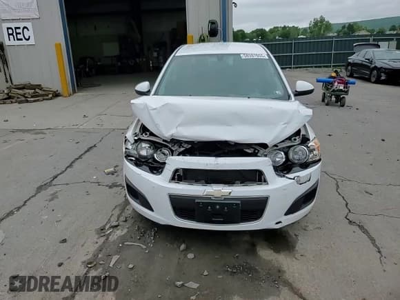 ✅ 2015 Chevrolet Sonic LS • VIN: 1G1JA6SG0F4184106 • Lot: 58597655. Listed on Copart with 82,360 mi. Free auction sales archive from the USA and detailed vehicle history report at DreamBid. Image 14.