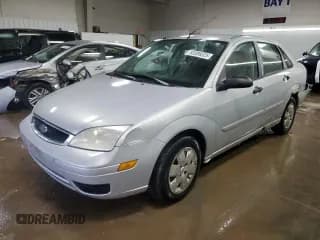 ✅ 2007 Ford Focus S • VIN: 1FAFP34NX7W232924 • Lot: 93389325. Listed on Copart with 150,699 mi. Free auction sales archive from the USA and detailed vehicle history report at DreamBid. Image 1.