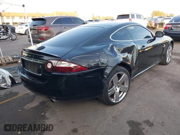 ✅ 2008 Jaguar XK • VIN: SAJWA43B985B23987 • Lot: 41197091. Listed on IAAI with 54,803 mi. Free auction sales archive from the USA and detailed vehicle history report at DreamBid. Image 4.