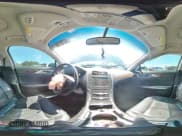 ✅ 2014 Lincoln MKZ • VIN: 3LN6L2G94ER835779 • Lot: 67018915. Listed on Copart with 158,560 mi. Free auction sales archive from the USA and detailed vehicle history report at DreamBid. Image 14.