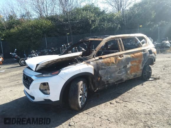 ✅ 2019 Hyundai Santa Fe Ultimate • VIN: 5NMS5CAD3KH054098 • Лот: 36305958. Опубликован ранее на IAAI с пробегом Не указан. Бесплатный доступ к архиву аукционных продаж из США и подробный отчёт об истории автомобиля на DreamBid. Изображение 2.