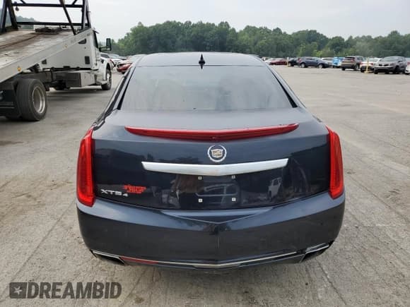 ✅ 2014 Cadillac XTS Premium • VIN: 2G61R5S38E9320696 • Лот: 67097665. Опубликован ранее на Copart с пробегом 142 603 миль. Бесплатный доступ к архиву аукционных продаж из США и подробный отчёт об истории автомобиля на DreamBid. Изображение 6.