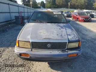 ✅ 1992 Plymouth Acclaim • VIN: 1P3XA46K8NF255561 • Lot: 74290964. Wystawiony na Copart z przebiegiem 126 154 mil. Bezpłatny archiwum sprzedaży aukcyjnych z USA i szczegółowy raport historii pojazdu na DreamBid. Zdjęcie 5.