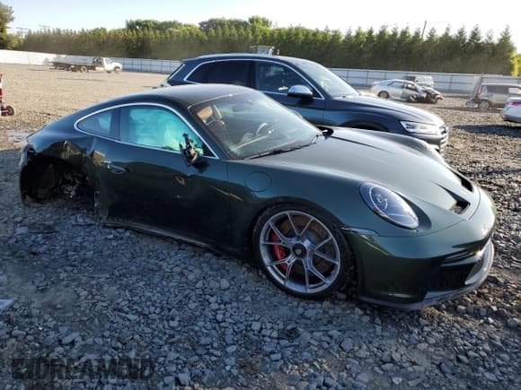 ✅ 2022 Porsche 911 GT3 • VIN: WP0AC2A9XNS270305 • Lot: 57119824. Listed on Copart with 4,926 mi. Free auction sales archive from the USA and detailed vehicle history report at DreamBid. Image 4.