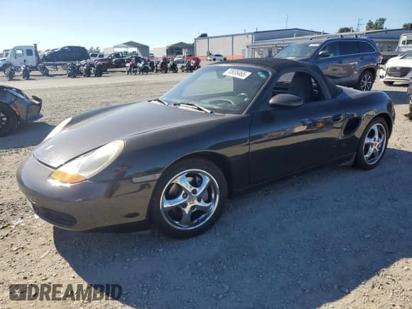✅ 1999 Porsche Boxster • VIN: WP0CA2982XU622732 • Lot: 70935465. Wystawiony na Copart z przebiegiem 83 049 mil. Bezpłatny archiwum sprzedaży aukcyjnych z USA i szczegółowy raport historii pojazdu na DreamBid. Zdjęcie 1.